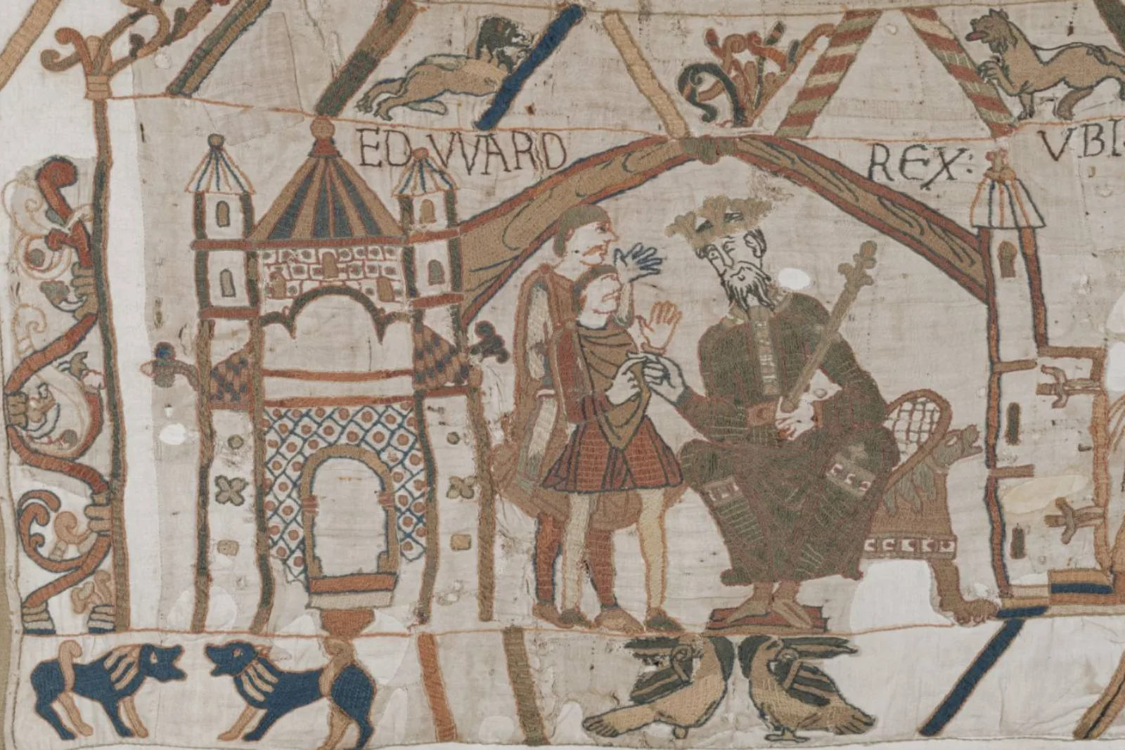 A section of the Bayeux tapestry showing a king talking to two people next to a castle.